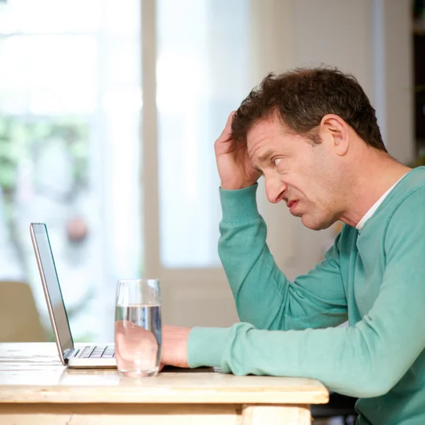 Man checking online to buy Sildenafil